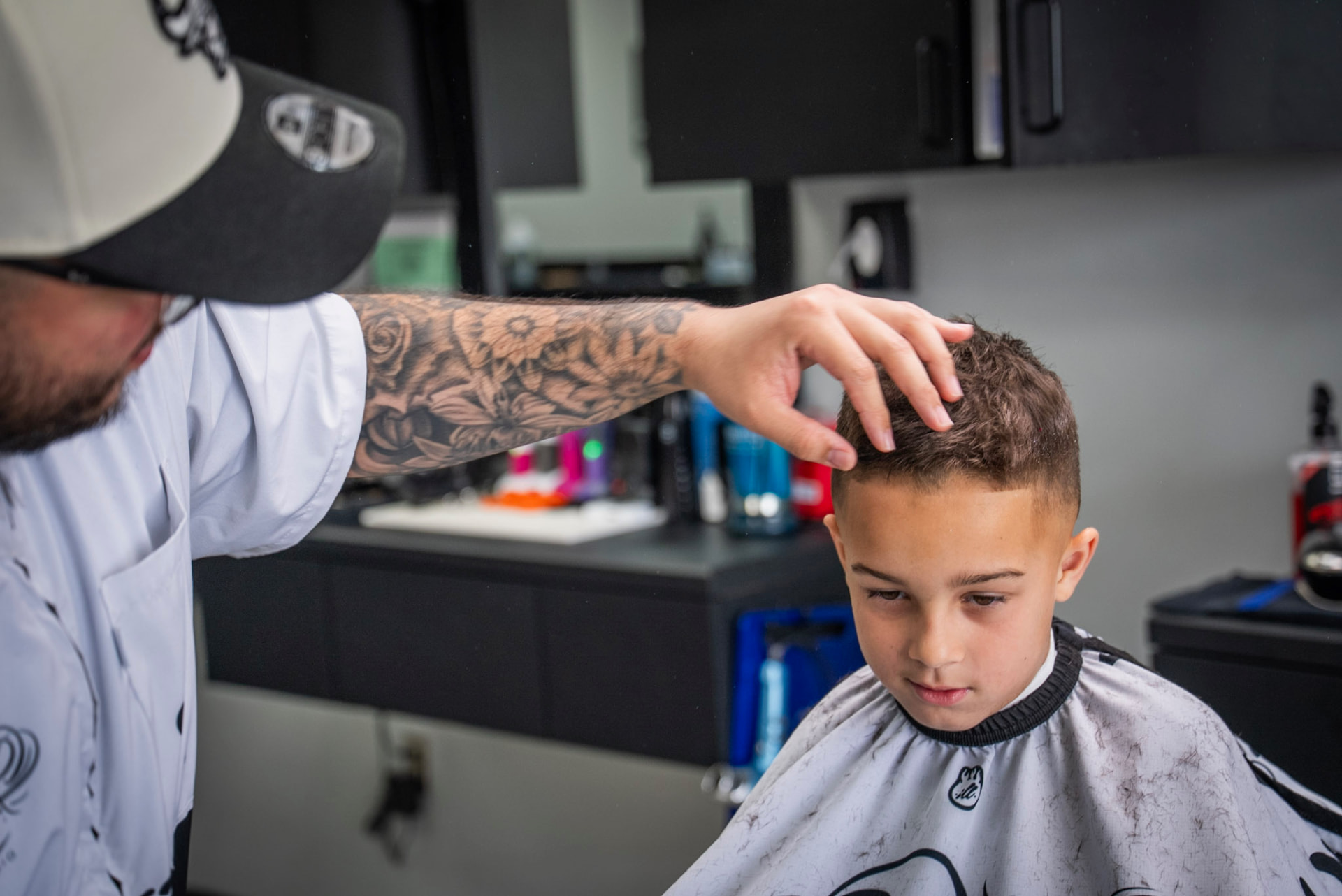 Young client getting a fresh fade at the studio